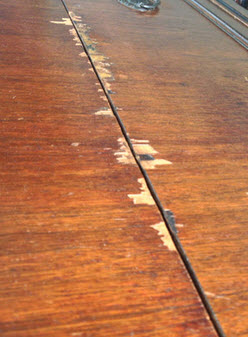 peeling wood veneer on modern table